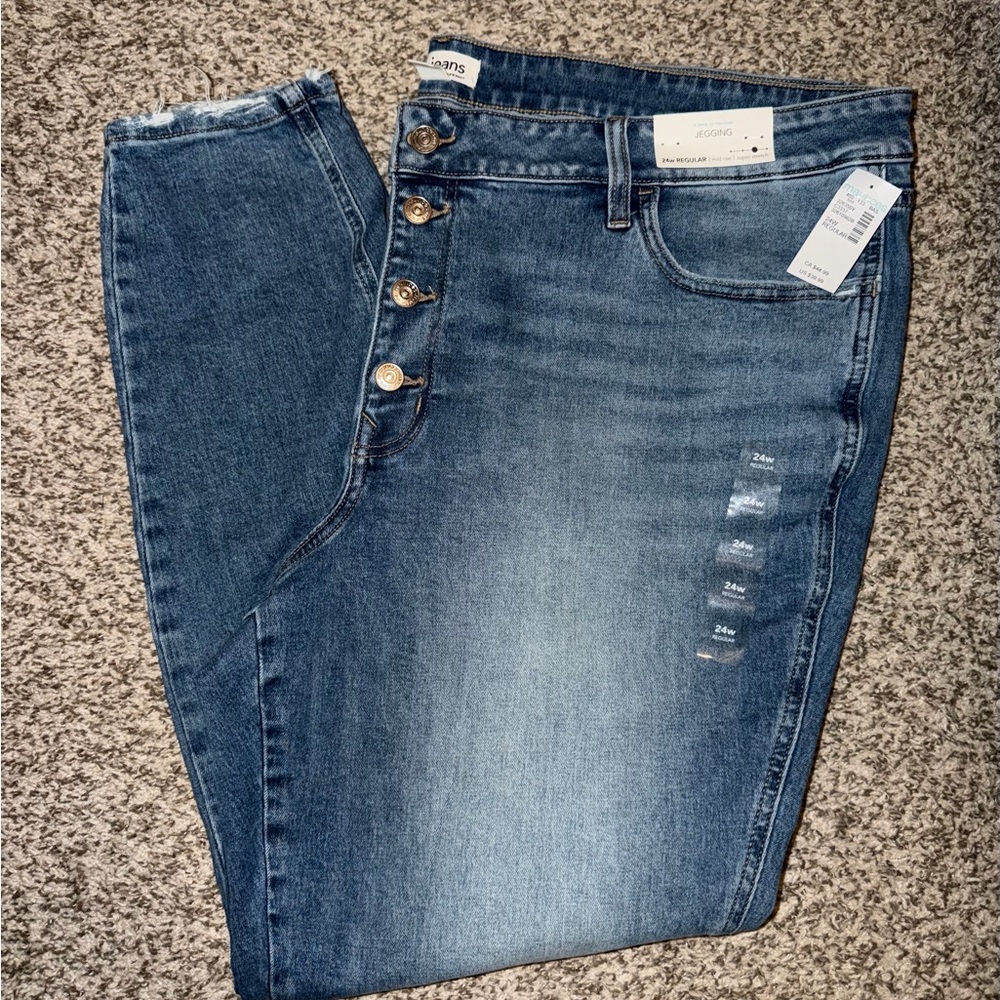 Maurice’s denim button fly mid rise jegging. Size 24w regular.